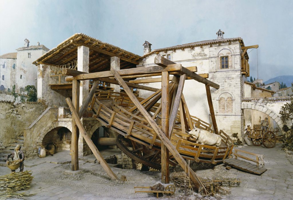 Einst halfen Ochsen dabei, die Mühlsteine von Getreidemühlen zu bewegen: Das Diorama zur Ochsentretscheibe im Deutschen Museum Foto: Deutsches Museum